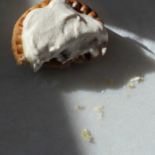 Lighthearted spiced plum tart.